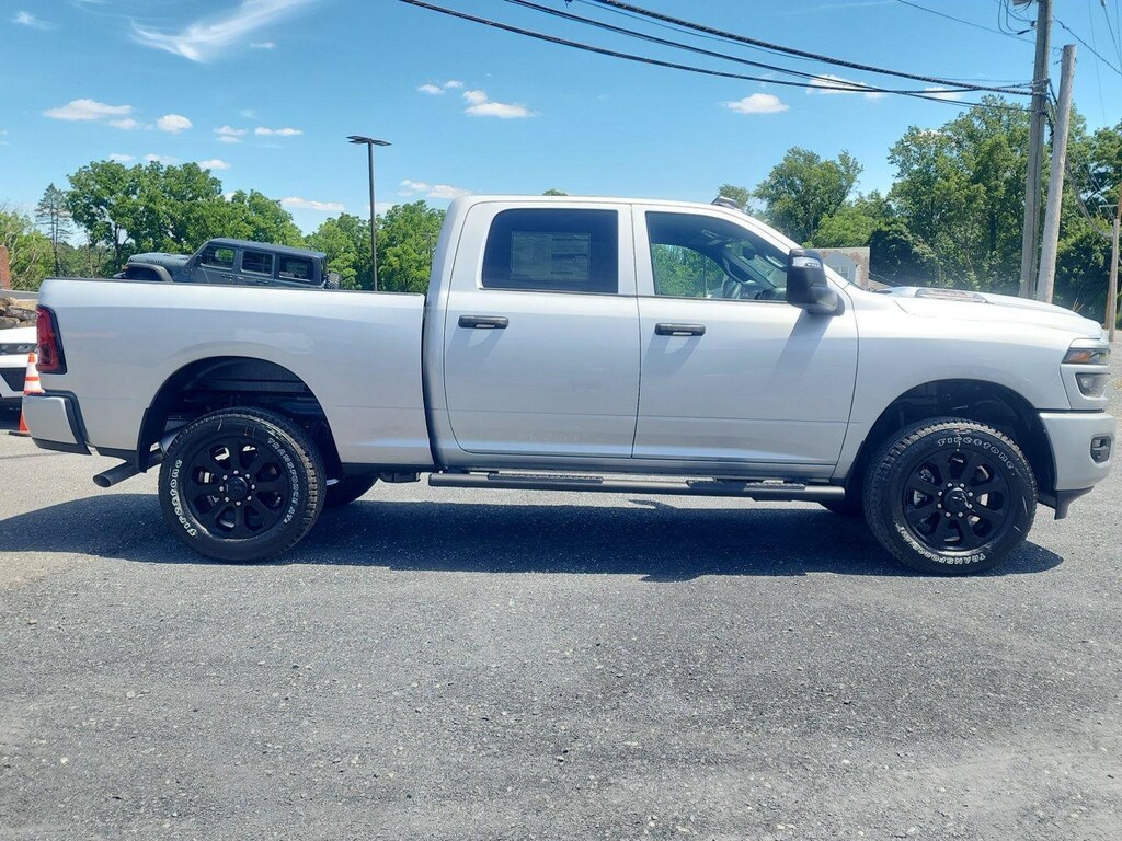New 2026 Ram 2500 BLACK EXPRESS CREW CAB 4X4 6'4 BOX Pickup