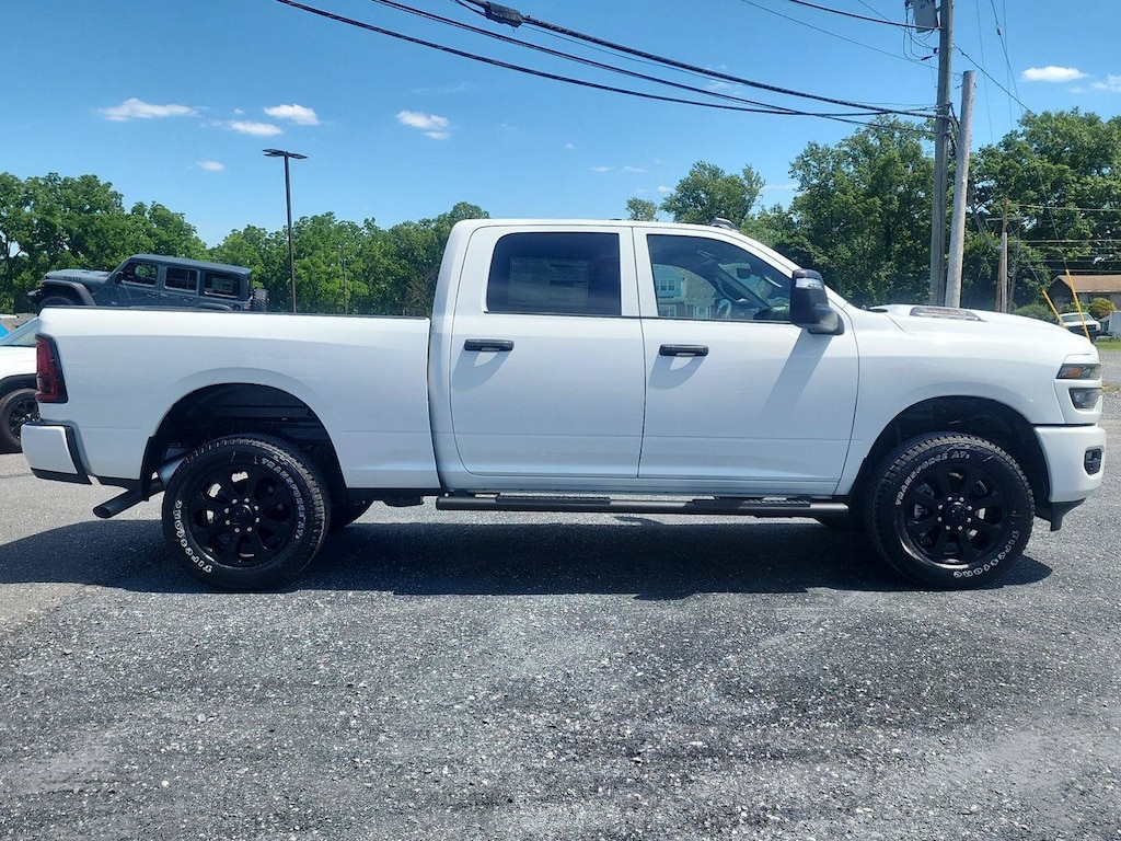 New 2026 Ram 2500 BLACK EXPRESS CREW CAB 4X4 6'4 BOX Pickup
