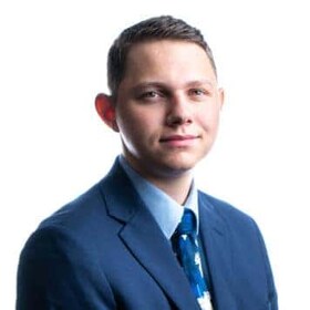 Staff member Tyler Bombardier from ID_696715