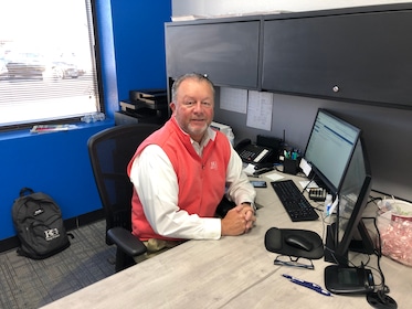 Staff member Greg Foster from 7f143814bf60
