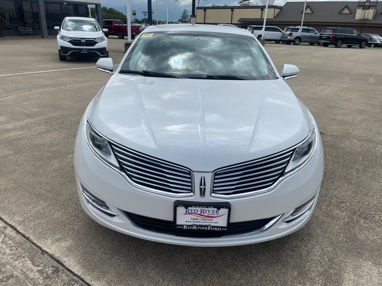 Used 2016 Lincoln MKZ Base with VIN 3LN6L2G94GR618137 for sale in Durant, OK