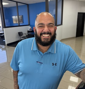 Staff member Pedro Suarez from 4715e8256019