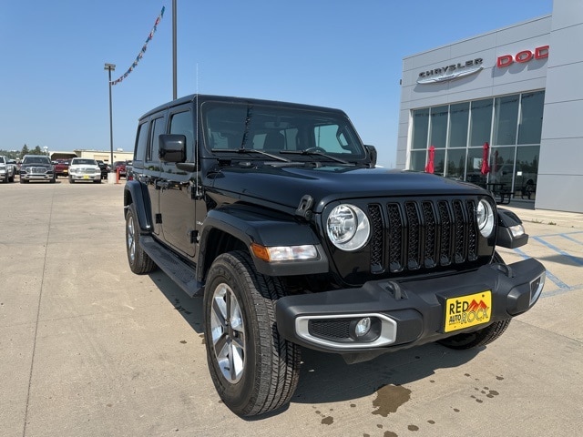 Used 2022 Jeep Wrangler Unlimited Sahara with VIN 1C4HJXEN2NW209385 for sale in Watford City, ND