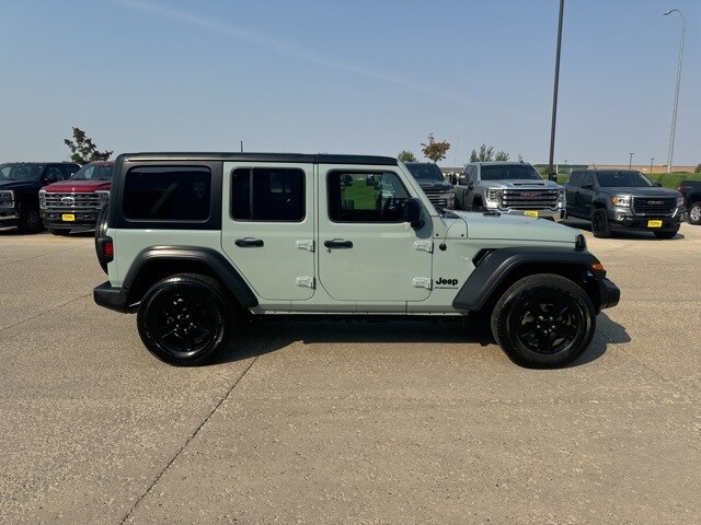 Used 2023 Jeep Wrangler 4-Door Altitude with VIN 1C4HJXDG4PW582885 for sale in Williston, ND