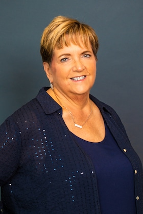 Staff member Sandy Monek from a9b1789e2fa8
