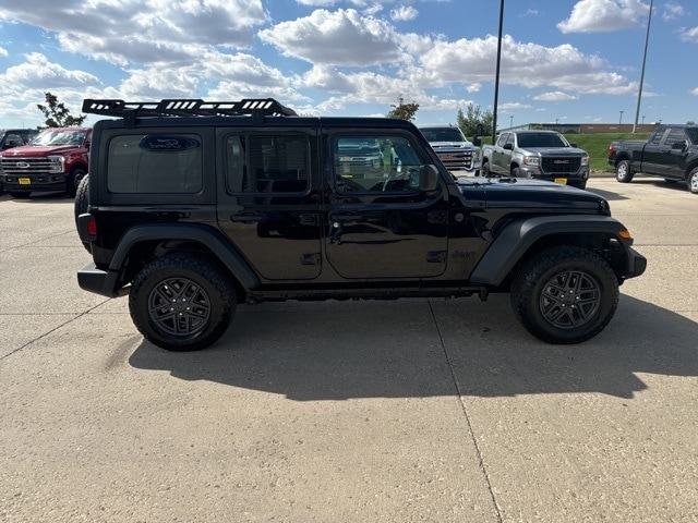 Used 2024 Jeep Wrangler 4-Door Sport S with VIN 1C4PJXDNXRW107562 for sale in Williston, ND