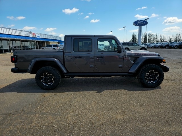 Used 2023 Jeep Gladiator Rubicon with VIN 1C6JJTBG7PL542144 for sale in Dickinson, ND