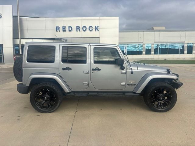 Used 2014 Jeep Wrangler Unlimited Sahara with VIN 1C4HJWEG3EL272900 for sale in Dickinson, ND