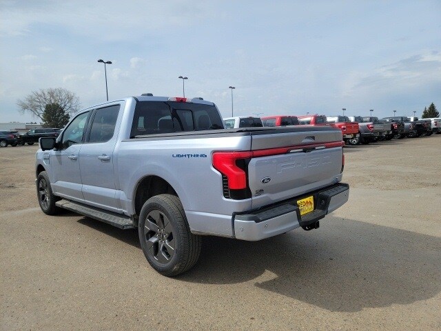 Used 2022 Ford F-150 Lightning Lariat with VIN 1FT6W1EV8NWG01213 for sale in Dickinson, ND