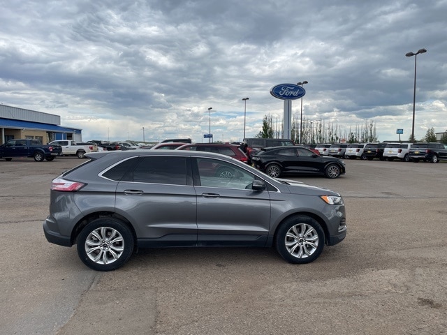 Used 2023 Ford Edge Titanium with VIN 2FMPK4K98PBA27124 for sale in Dickinson, ND