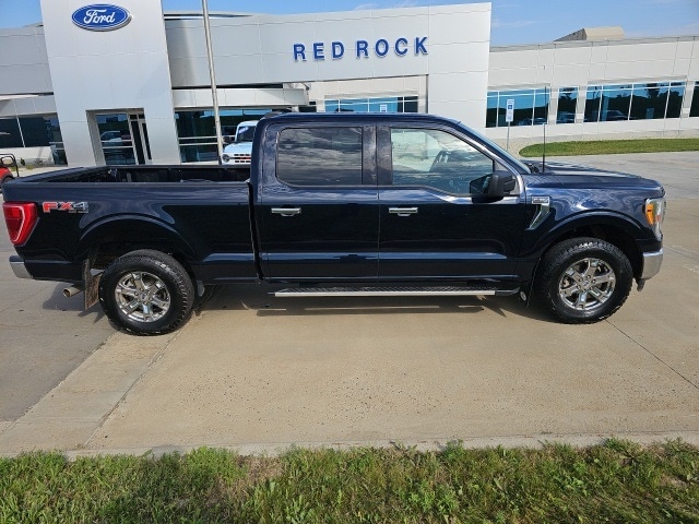 Used 2022 Ford F-150 XLT with VIN 1FTFW1E55NFA52649 for sale in Dickinson, ND