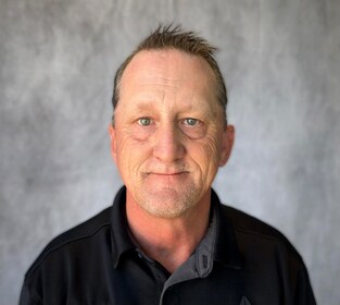 Staff member Denton Fortenberry from ID_b8fe68431bef