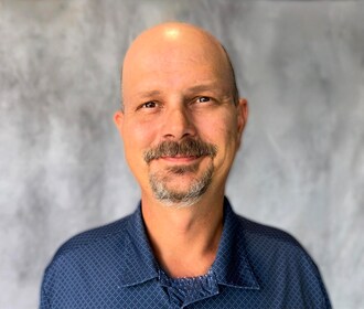 Staff member Brant Roshau from ID_38719ae14e6f