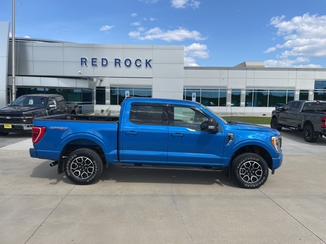 Used 2021 Ford F-150 XLT with VIN 1FTFW1E57MKD82587 for sale in Dickinson, ND
