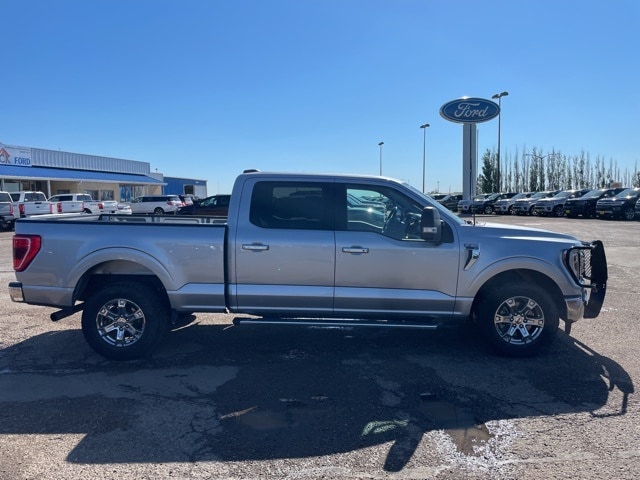 Used 2022 Ford F-150 XLT with VIN 1FTFW1E87NKD09814 for sale in Dickinson, ND