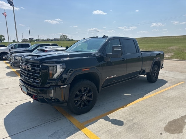 Used 2024 GMC Sierra 2500HD AT4 with VIN 1GT49PE72RF209191 for sale in Dickinson, ND