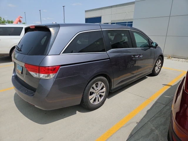 Used 2014 Honda Odyssey EX-L with VIN 5FNRL5H62EB061007 for sale in Dickinson, ND