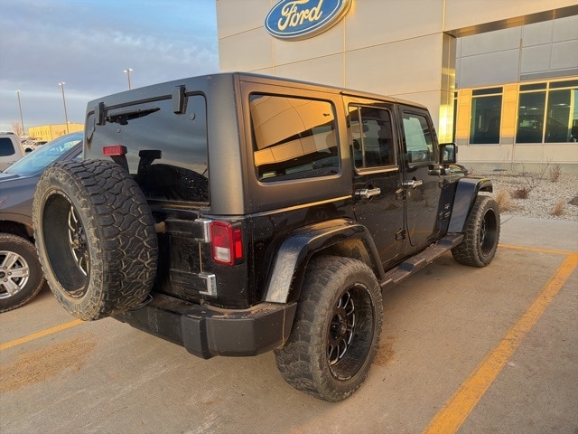 Used 2017 Jeep Wrangler Unlimited Sahara with VIN 1C4BJWEG8HL555058 for sale in Dickinson, ND
