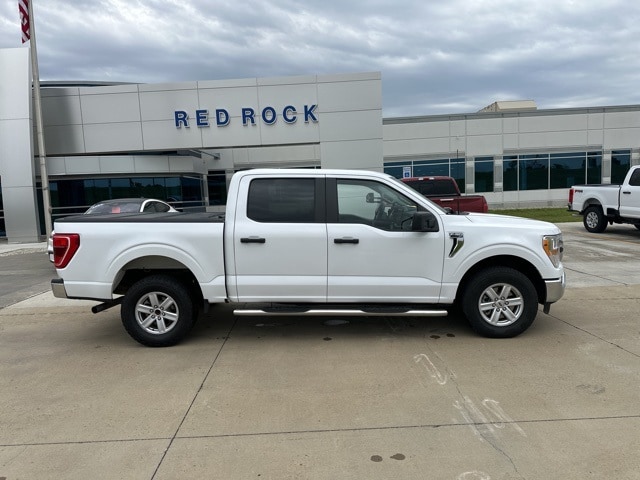 Used 2021 Ford F-150 XLT with VIN 1FTFW1E88MKE26316 for sale in Dickinson, ND