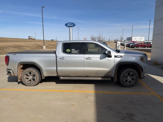 Used 2021 GMC Sierra 1500 SLE with VIN 1GTU9BET2MZ105520 for sale in Dickinson, ND