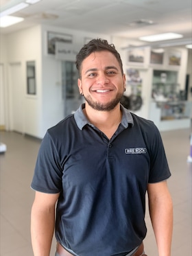 Staff member Hugo Mendoza from ID_86f703c3795b