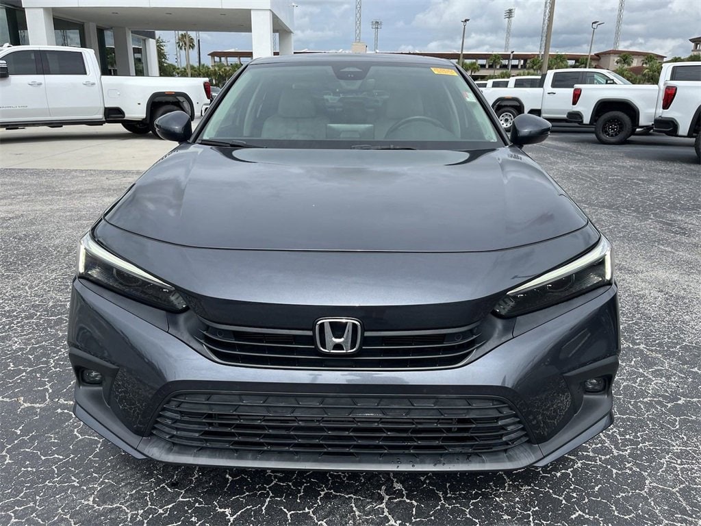 Used 2022 Honda Civic Touring with VIN 2HGFE1F95NH305392 for sale in Lakeland, FL