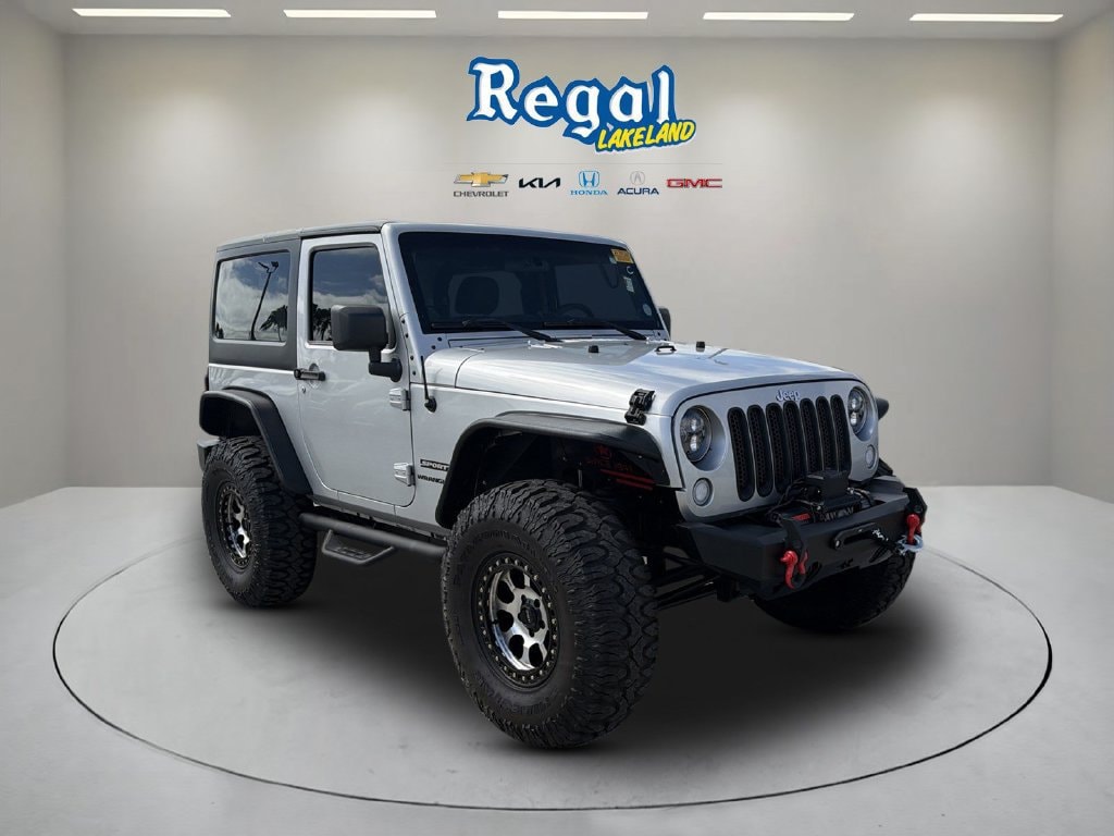 Used 2012 Jeep Wrangler Sport with VIN 1C4AJWAG5CL204036 for sale in Lakeland, FL