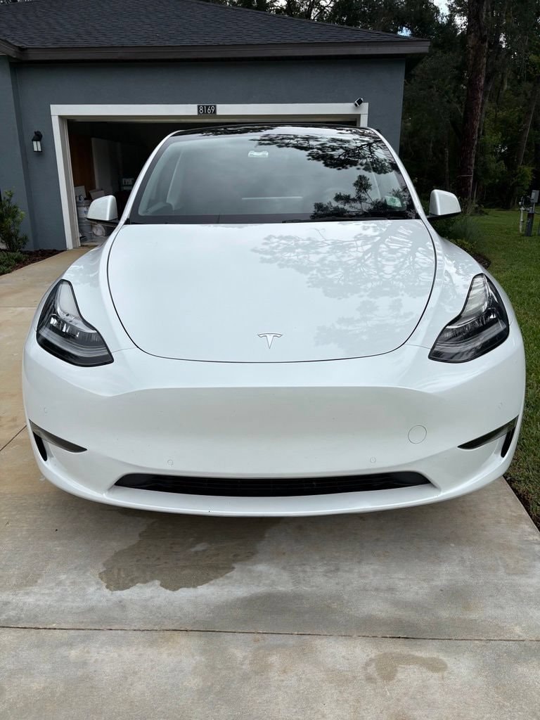 Used 2022 Tesla Model Y Long Range with VIN 7SAYGAEE6NF415067 for sale in Lakeland, FL