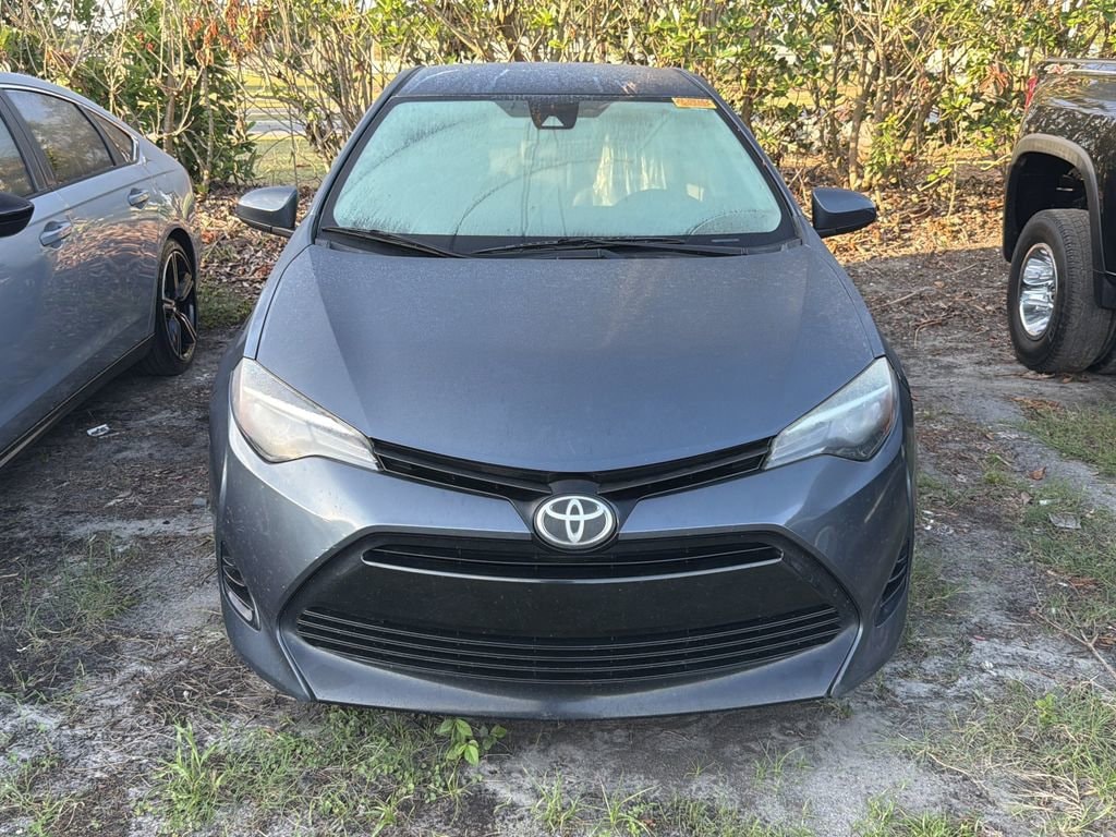 Used 2017 Toyota Corolla LE with VIN 2T1BURHE1HC815679 for sale in Lakeland, FL