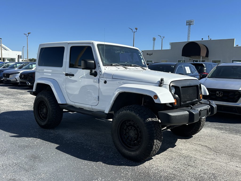 Used 2011 Jeep Wrangler Sport with VIN 1J4AA2D1XBL624044 for sale in Lakeland, FL