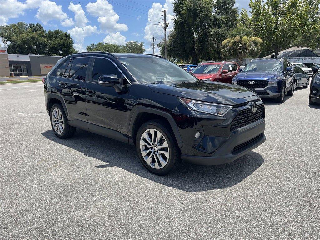 Used 2021 Toyota RAV4 XLE Premium with VIN 2T3C1RFVXMC114463 for sale in Lakeland, FL