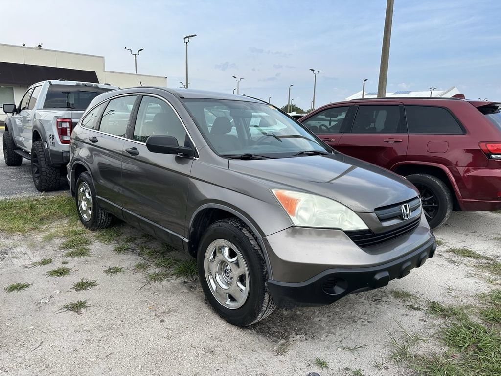 Used 2009 Honda CR-V LX with VIN 5J6RE38399L027731 for sale in Lakeland, FL