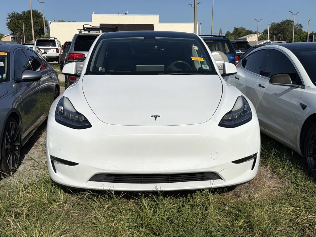 Used 2022 Tesla Model Y Long Range with VIN 7SAYGAEE6NF415067 for sale in Lakeland, FL