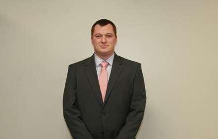 Staff member Tom Mitchell from 5f3a3a05744c