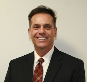 Staff member Roger Barton from 5f3a3a05744c