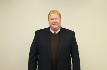 Staff member Mike Packey from 5f3a3a05744c