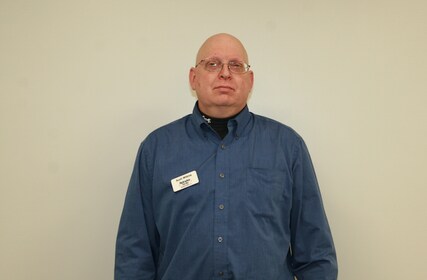 Staff member Scott Wilkins from 5f3a3a05744c