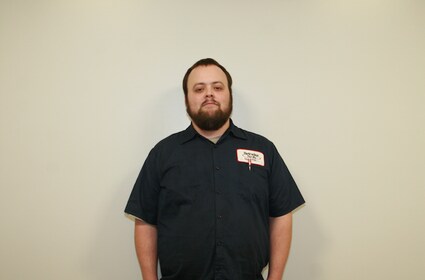 Staff member Aaron Brackman from 5f3a3a05744c