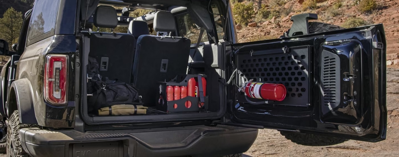 The open tailgate and cargo area of a 2024 Ford Bronco for sale near Bowling Green.