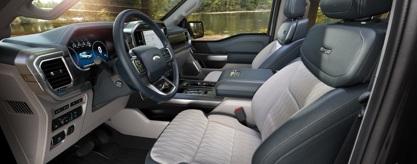 The grey and black interior is shown in a 2023 Ford F-150 Limited.