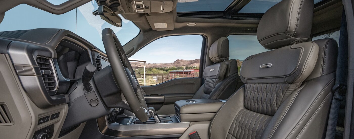 The grey leather interior of a 2024 Ford F-150 for sale near Defiance.