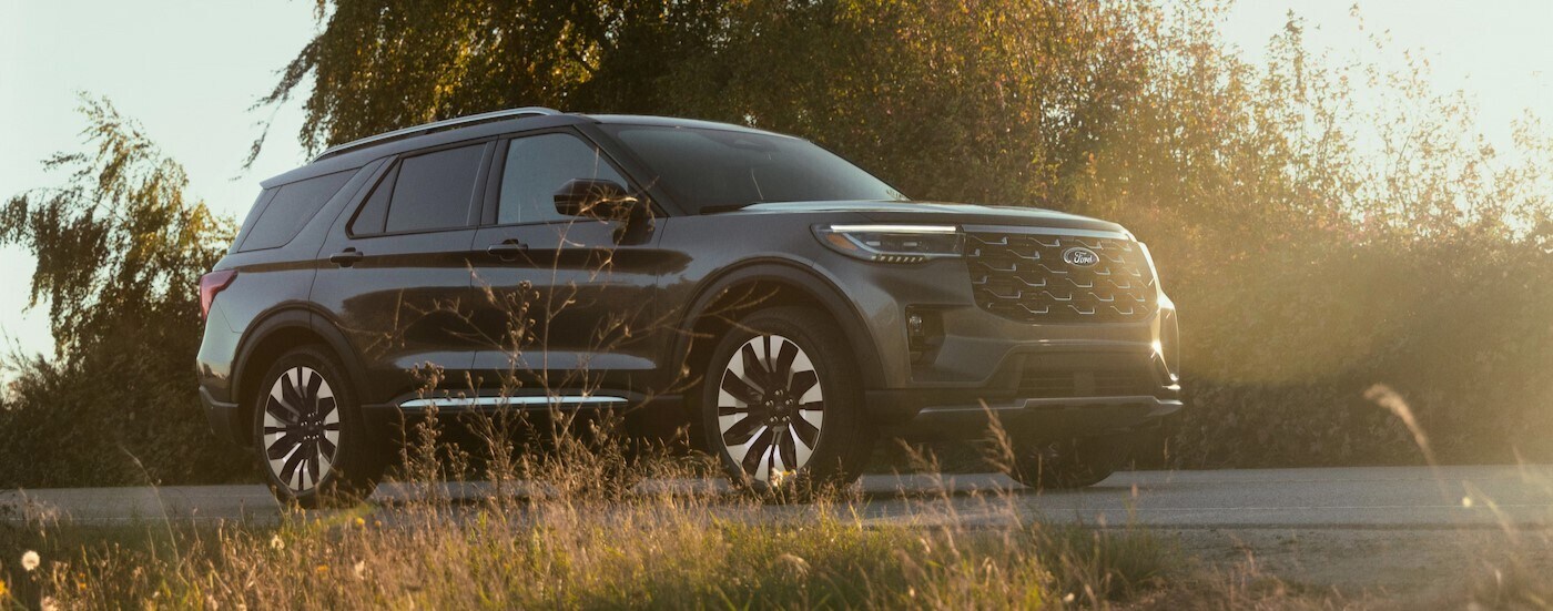 A black 2025 Ford Explorer for sale near Toledo parked on pavement.