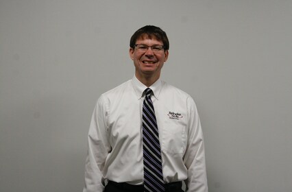 Staff member Chris Bauer from 5f3a3a05744c