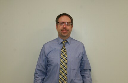 Staff member Ryan Crawford from 5f3a3a05744c