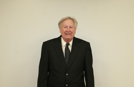 Staff member Alan Robinson from 5f3a3a05744c