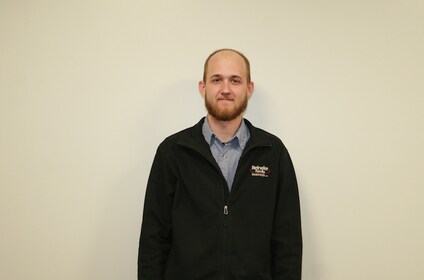 Staff member Dustin Cole from 5f3a3a05744c