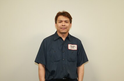 Staff member Naikham Bouaphakeo from 5f3a3a05744c
