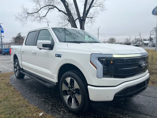 Used 2024 Ford F-150 Lightning Platinum with VIN 1FT6W7L79RWG24383 for sale in Fostoria, OH