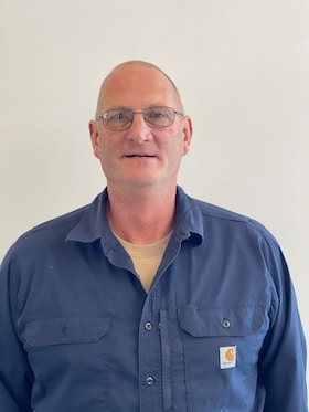 Staff member Larry Cox from ID_7d5214e8b429