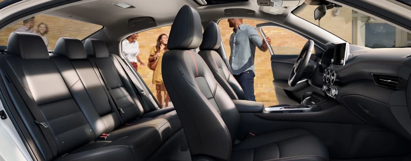 The black interior and dash in a 2025 Nissan Sentre for sale near Troy.